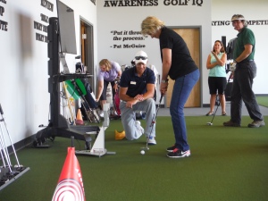 Yvonne tuning up the putting
